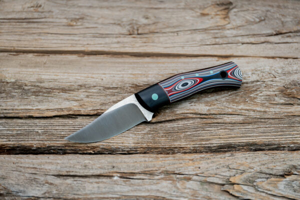 Buccaner - Fordite w/ Black Canvas Micarta